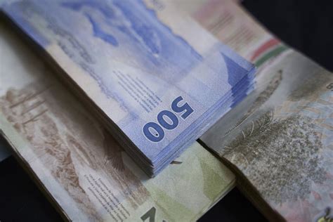 6.99 dollar to peso|Mexican Peso Sinks as Judicial Overhaul Clears First Hurdle.